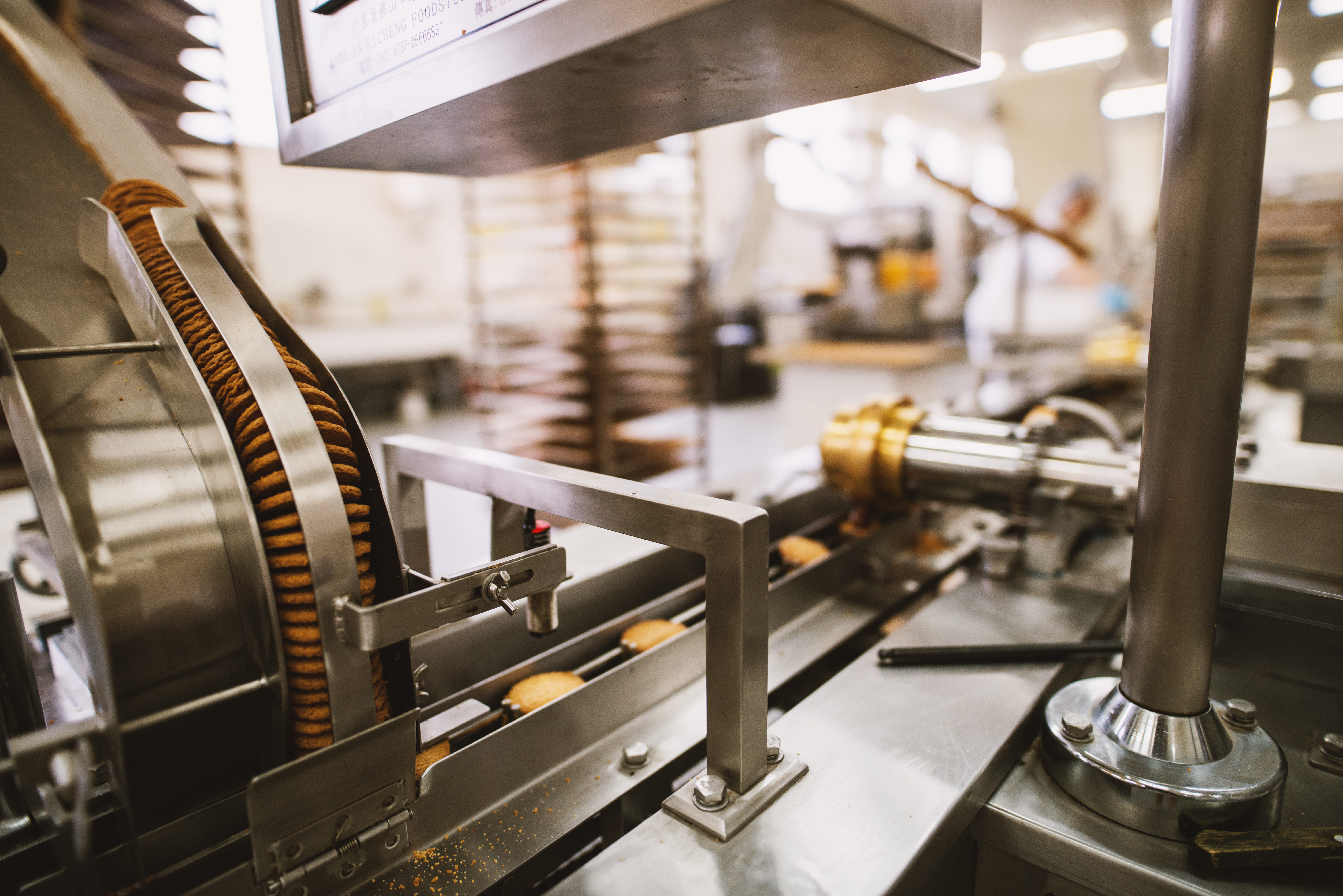 Food production machinery operating in a factory.