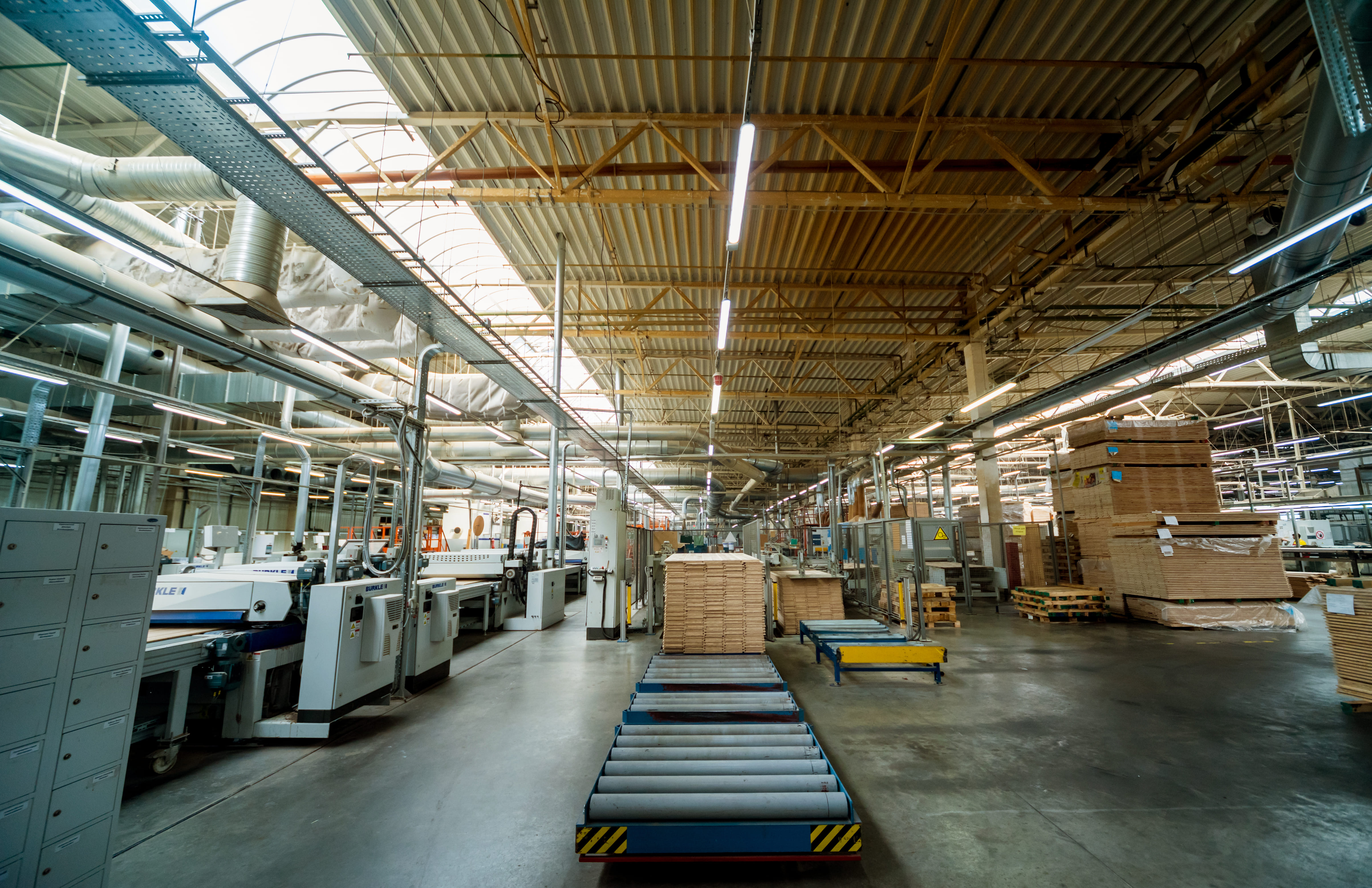 Production facility with material handling equipment